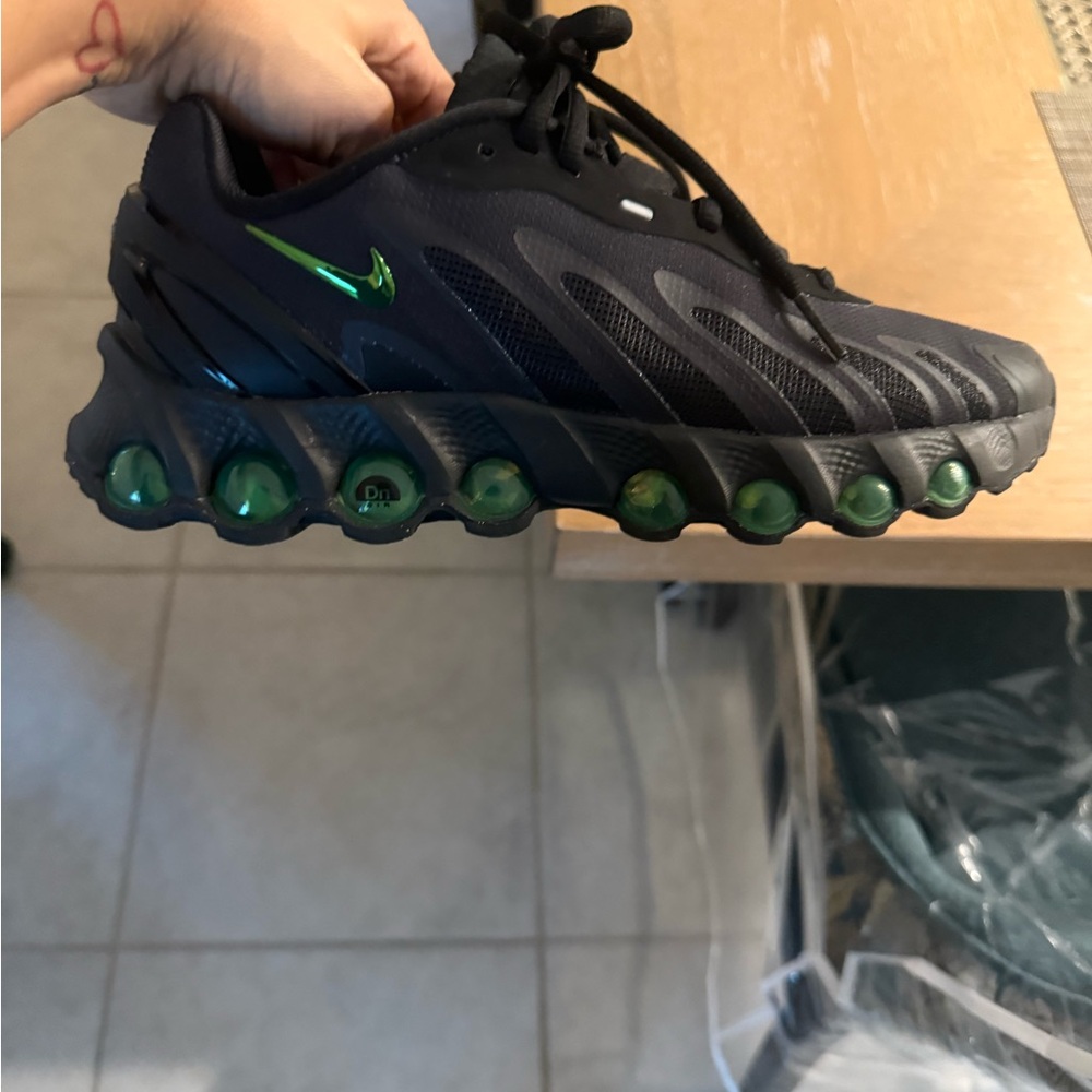 Nike Black Sneakers with Green Accents-
